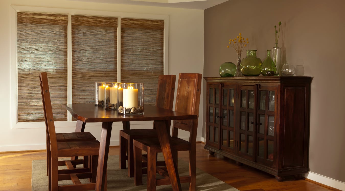 Woven shutters in a New York dining room.